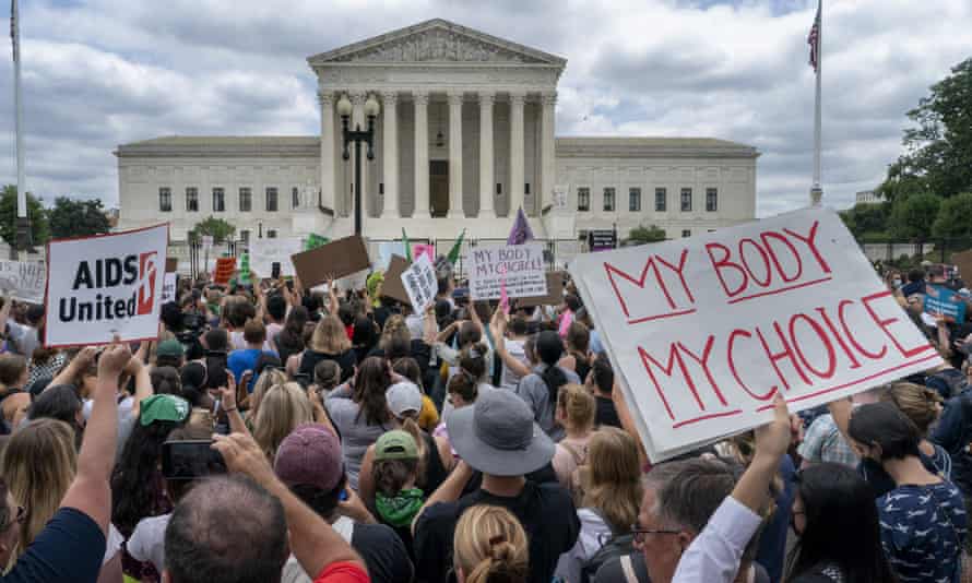 Protesters gather following the supreme court’s decision to overturn Roe v. Wade on Friday.