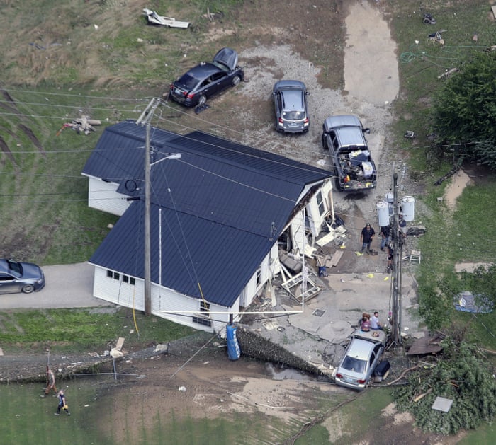 This home in eastern Kentucky is washed onto a road on Saturday, July 30, 2022, after historic rains.