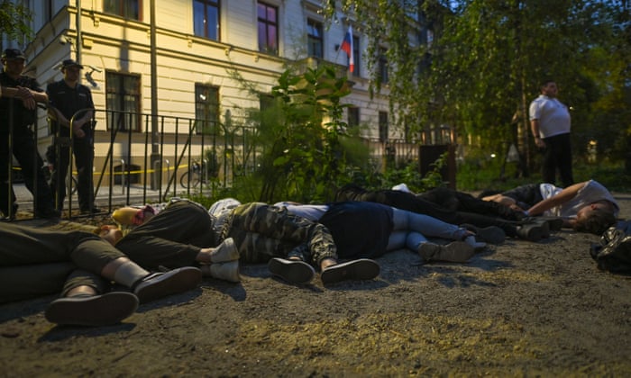 A scene set up by young Ukrainian activists representing Ukrainian people who are kept in cages and tortured by the Russian military occupiers before their execution. On the 177th day of the Russian invasion of Ukraine, members of the Ukrainian diaspora in Krakow and their supporters organised a support protest in front of the Russian consulate general in Krakow.