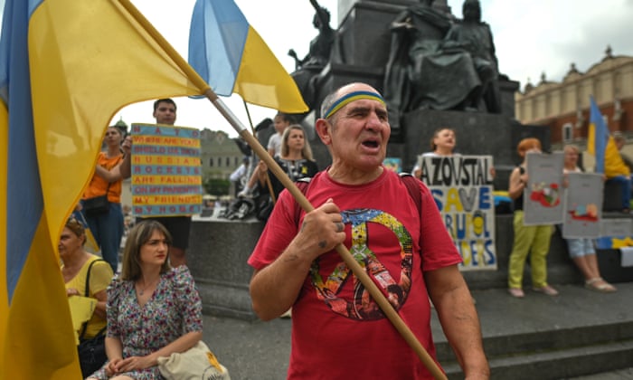 Aa member of the local Ukrainian diaspora is seen during a daily protest in Krakow’s main square.