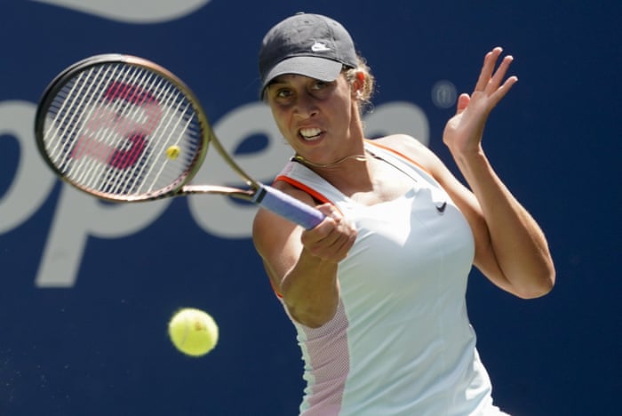 Madison Keys returns a shot to Camila Giorgi.