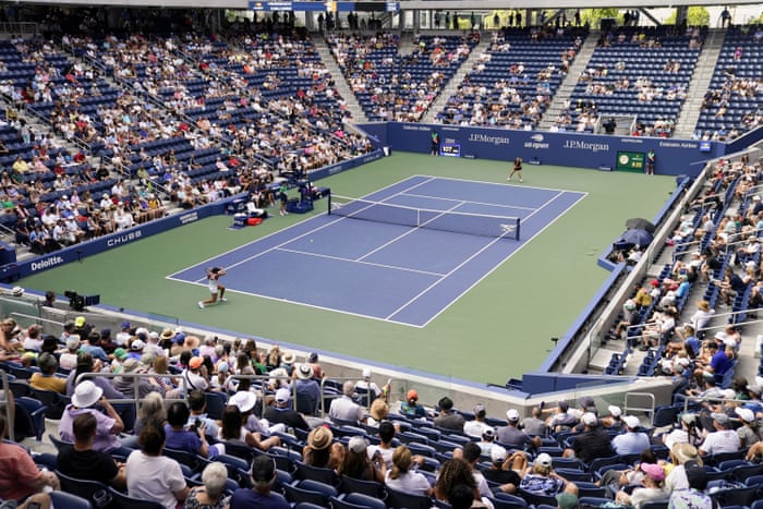 Madison Keys returns a shot to Camila Giorgi.